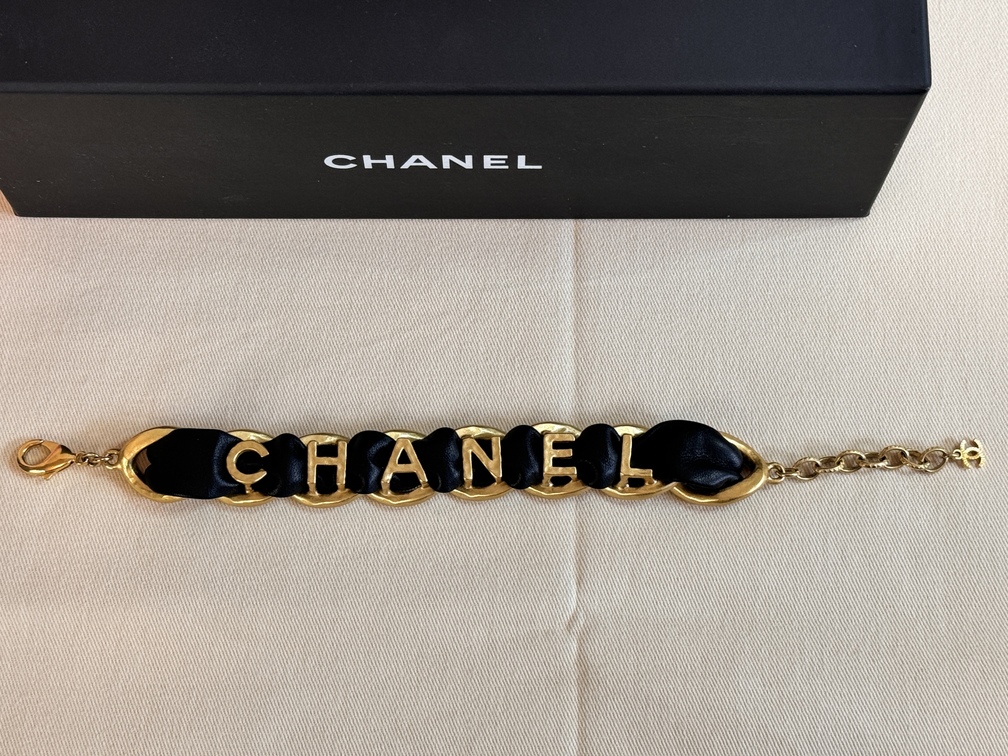 Armband CHANEL schwarz / gold