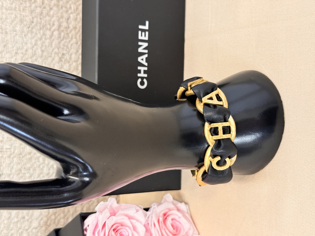 Armband CHANEL schwarz / gold