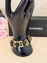 Armband CHANEL schwarz / gold