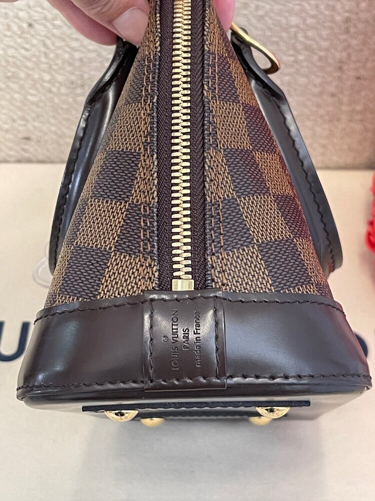 Help, what color is damier alma mm?